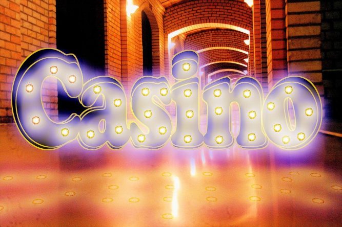 the word casino written with sparkling letters