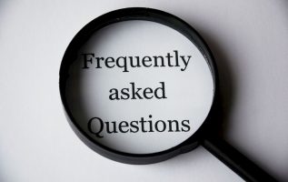 a loupe looking into frequently asked questions